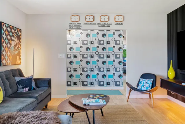 a living room with furniture and a window