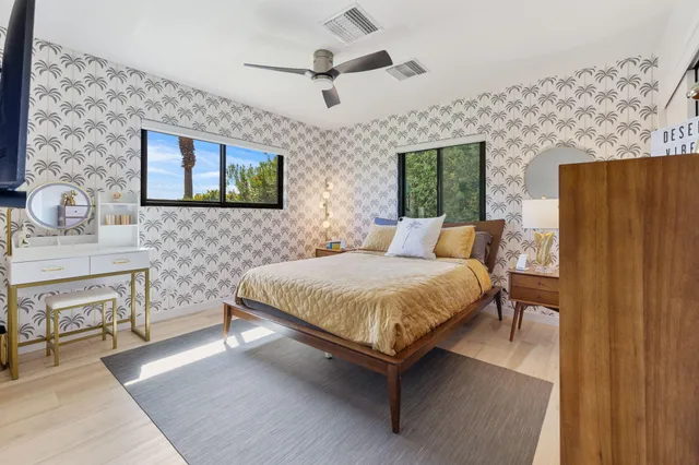 a view of a street with a yard