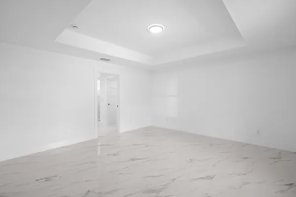 an empty room with an entryway