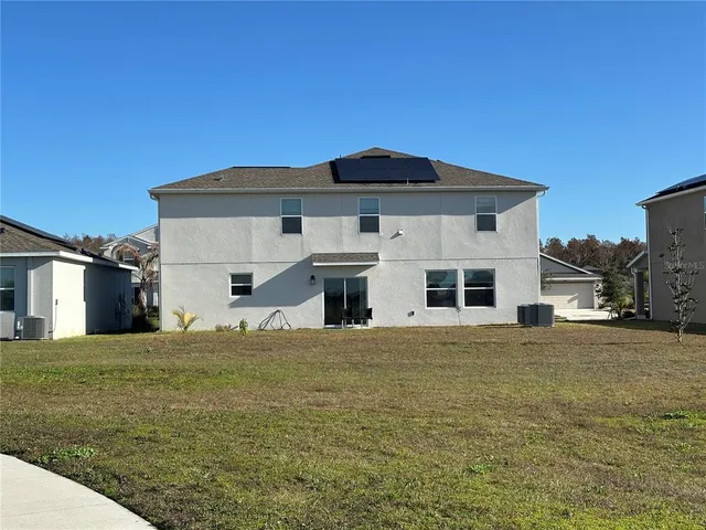 a house with yard in front of it