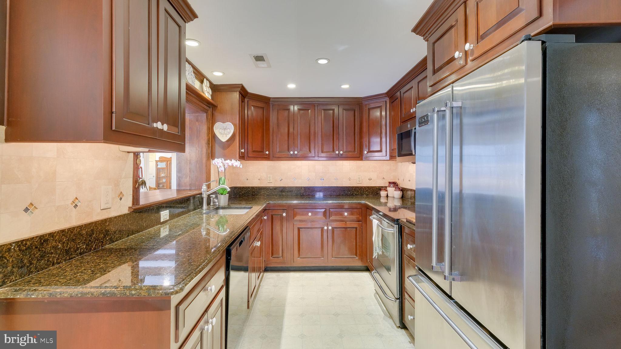 563 Pebble Hill Road Doylestown, PA 18901 - Photo 18 of 82 Stepsaver cherry kitchen with ss appliances