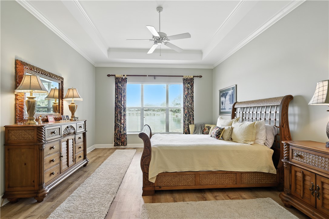 620 Bridgewater Lane Southwest Vero Beach, FL 32962 - Photo 15 of 31 a bedroom with a large bed and a window