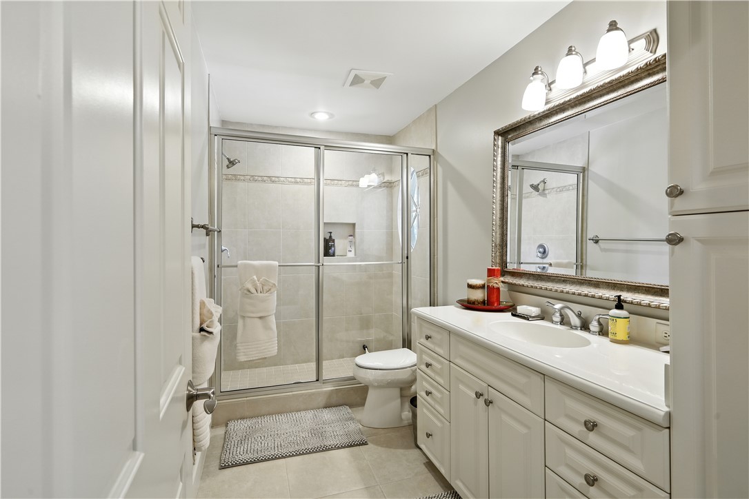 620 Bridgewater Lane Southwest Vero Beach, FL 32962 - Photo 20 of 31 a bathroom with a double vanity sink mirror double and shower