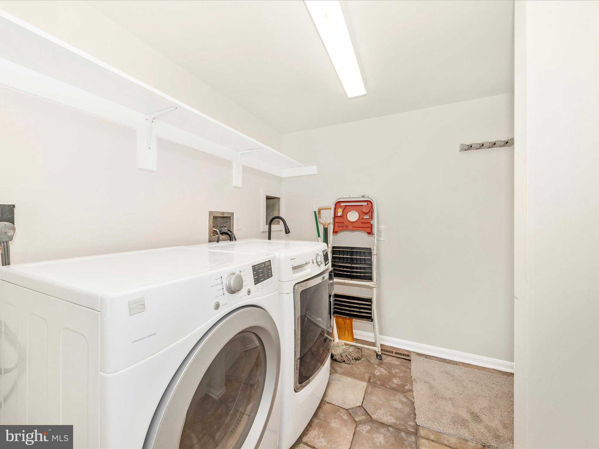 8395 Buckeye Court Frederick, MD 21702 - Photo 19 of 56 a utility room with dryer and washer