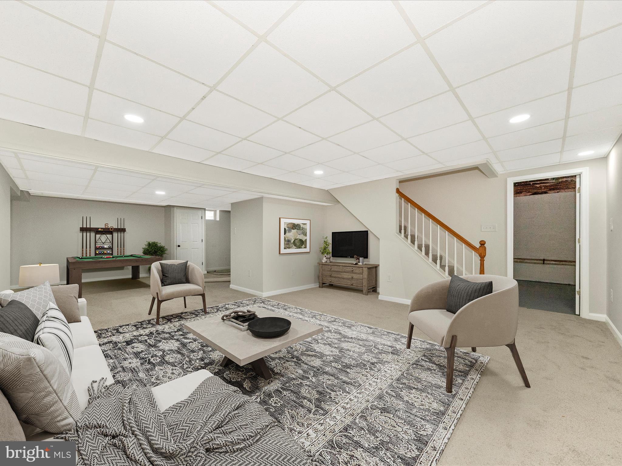 8395 Buckeye Court Frederick, MD 21702 - Photo 34 of 56 a living room with furniture and a table