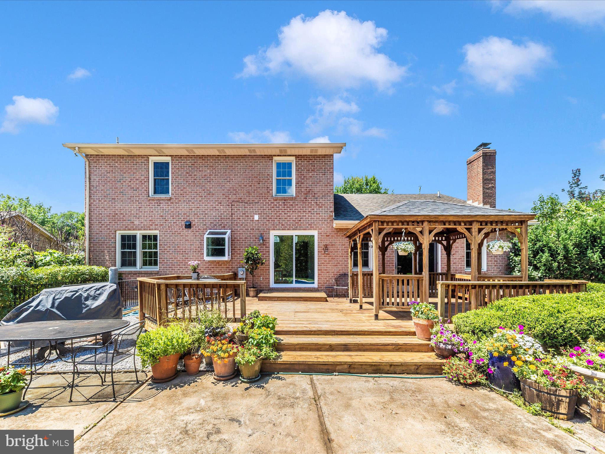 8395 Buckeye Court Frederick, MD 21702 - Photo 47 of 56 a front view of a house with a garden