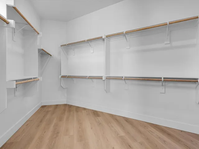 a bathroom with a shower and a toilet