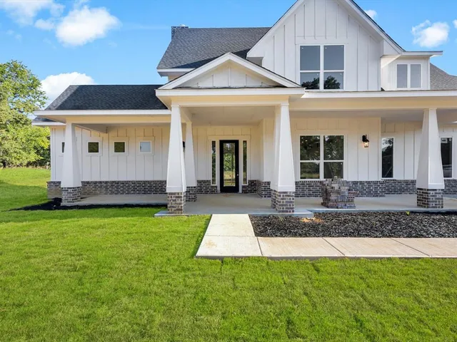 a view of a house with a garden