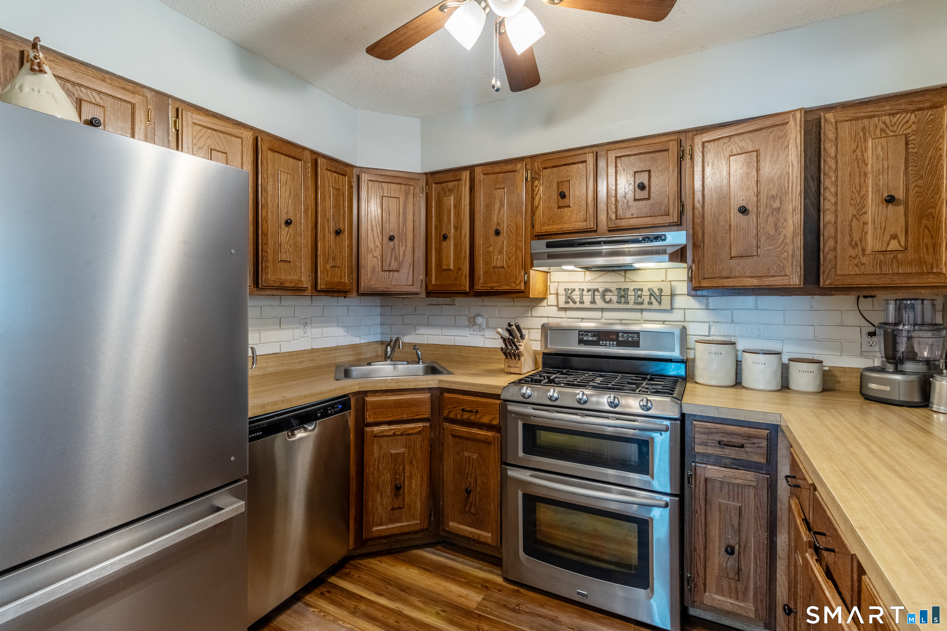 94 Cottonwood Road, Unit 94 Newington, CT 06111 - Photo 9 of 33 Full Kitchen with opening to Dining Area.