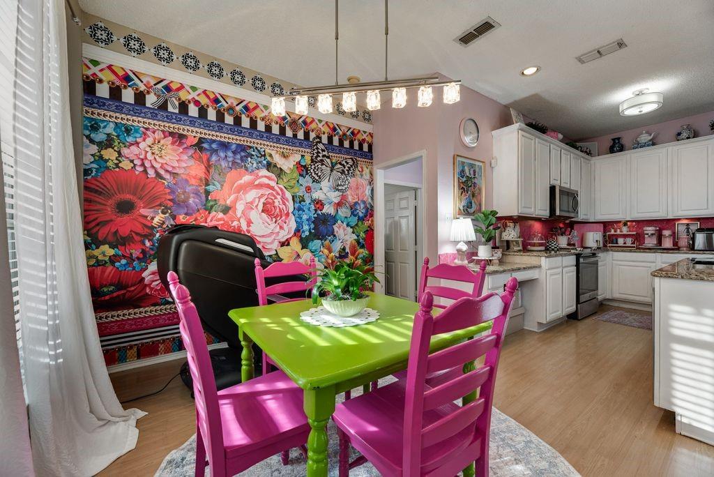 3205 Cape Cod Court Arlington, TX 76017 - Photo 9 of 30 a room with musical instruments and a table
