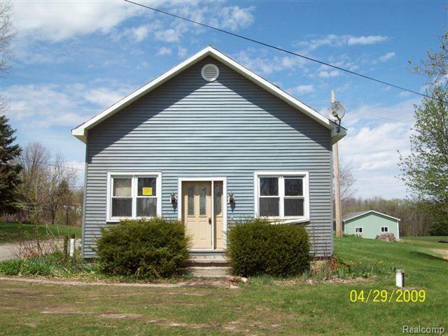 141 Daley Road Lapeer, MI 48446 - Photo 1 of 9 front