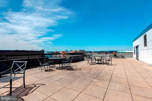 a view of a terrace with chairs