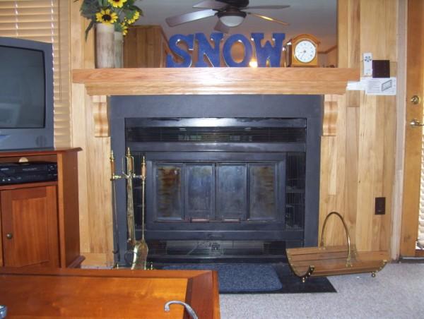 77 Powderidge Road Snowshoe, WV 26209 - Photo 8 of 13 Cozy up on those snowy nights next to your wood burning fireplace.