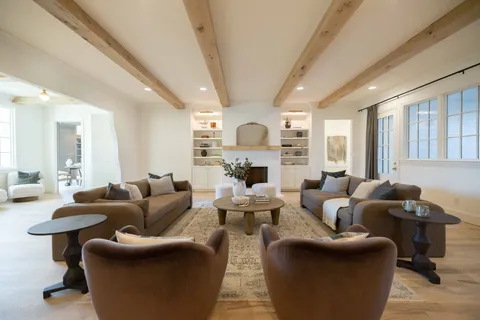 a bathroom with a sink a mirror and toilet