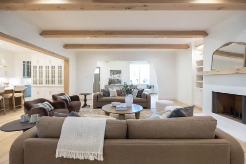 a bathroom with a granite countertop sink a toilet and shower