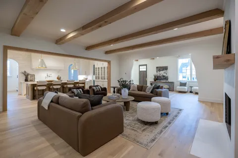 a view of an empty room and a window