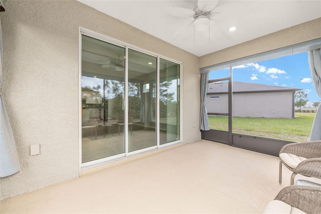 5966 Southwest 93rd Circle Ocala, FL 34481 - Photo 35 of 41 a view of an empty room with a sliding door