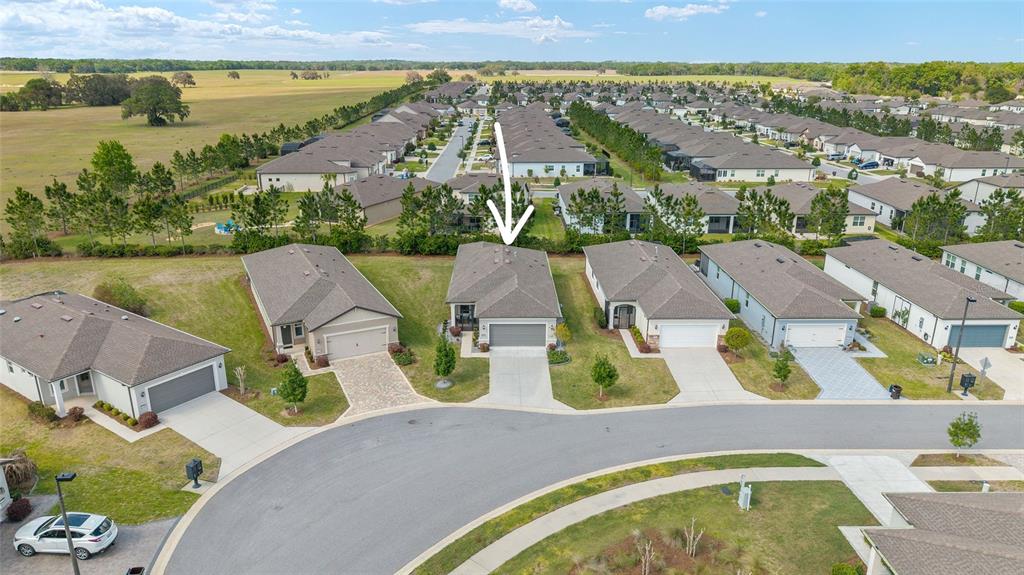 5966 Southwest 93rd Circle Ocala, FL 34481 - Photo 38 of 41 an aerial view of residential houses with outdoor space and river