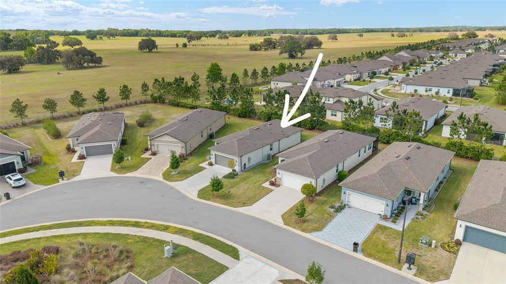 5966 Southwest 93rd Circle Ocala, FL 34481 - Photo 39 of 41 an aerial view of residential houses with outdoor space