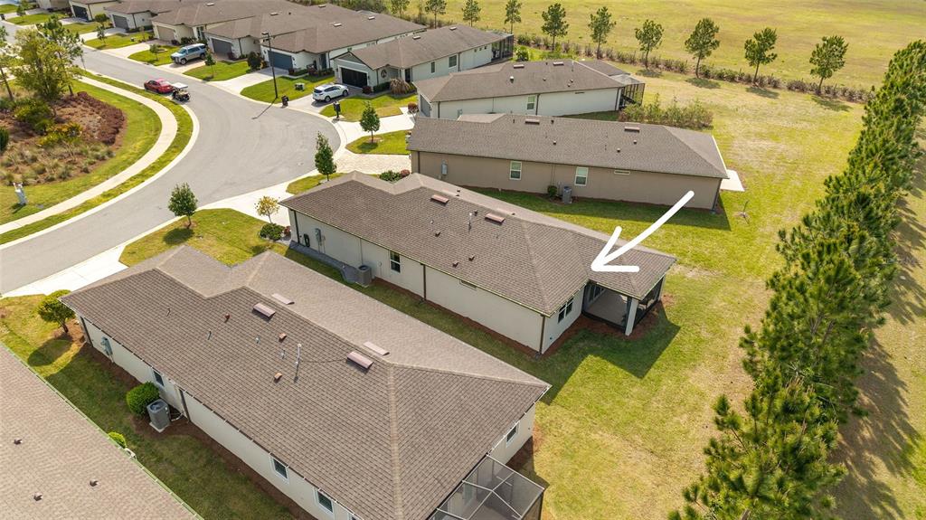 5966 Southwest 93rd Circle Ocala, FL 34481 - Photo 40 of 41 an aerial view of a house with a ocean view