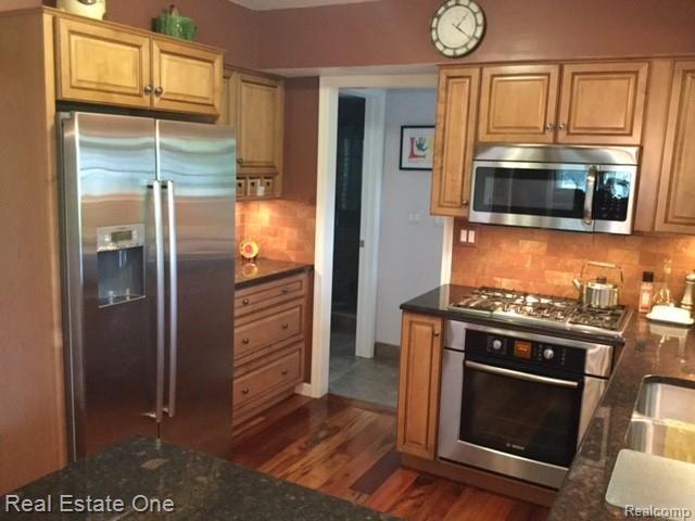 14955 28 Mile Road Washington, MI 48094 - Photo 7 of 51 TOP OF THE LINE STAINLESS APPLIANCES INCLUDED