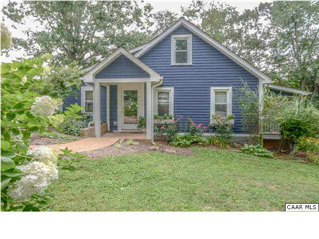 3938 Richmond Road Keswick, VA 22947 - Photo 1 of 37 A meandering walk set under a large oak, bordered by abundant flowering shrubs & a backdrop of white board fencing & barn create a truly winsome picture. This jewel of a mini-farm captivates with its charm, comfort, & modern updates.