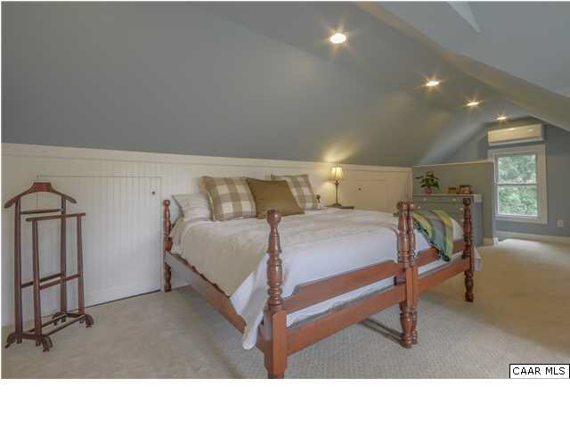 3938 Richmond Road Keswick, VA 22947 - Photo 25 of 37 A beautiful attic conversion has created this delightful master suite. Crisp white beadboard wainscoting w/wedgewood blue walls creates a classic yet light & cheery atmosphere.
