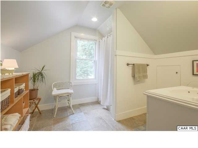 3938 Richmond Road Keswick, VA 22947 - Photo 27 of 37 Relax, catch up on your emailing, read a good book...this cozy sitting area is tucked into a huge dormer w/double window & functional built-in bookcases. A walk-in closet & under eave space, w/multiple access doors, provide plenty of storage.