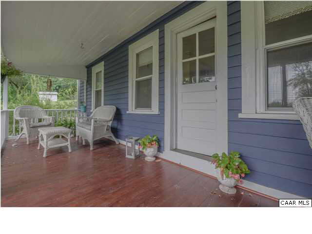 3938 Richmond Road Keswick, VA 22947 - Photo 4 of 37 The "front" of the home has a traditional farmhouse look w/welcoming covered front porch & quaint dormer over entry. Thoughtful & tasteful additions & renovations have added comfort while preserving the character of the original cottage.