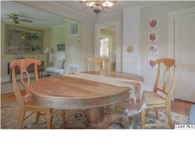3938 Richmond Road Keswick, VA 22947 - Photo 6 of 37 Enter through the solid wood paneled door w/four lite window on top & find yourself in a large foyer/dining room combo. Soft daylight streaming through the windows on each side of it supplements the light of the entry door.