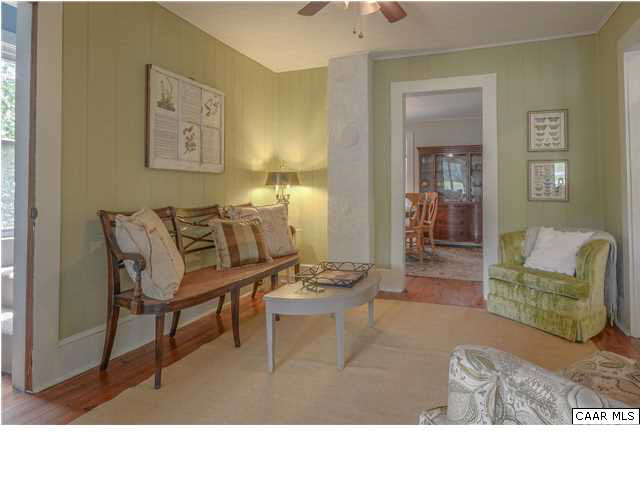 3938 Richmond Road Keswick, VA 22947 - Photo 8 of 37 From the dining room, you can catch a tantalizing glimpse of the sunroom through the sitting room/parlor.