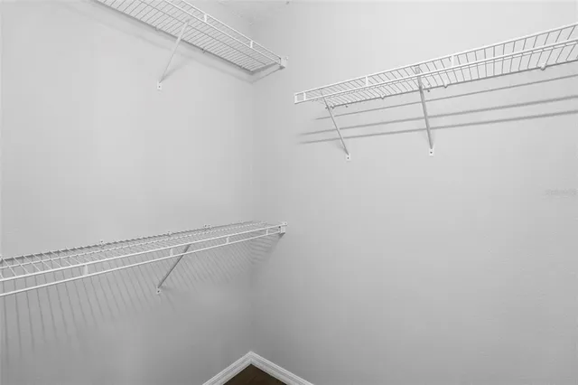 a view of a room with racks on the wall