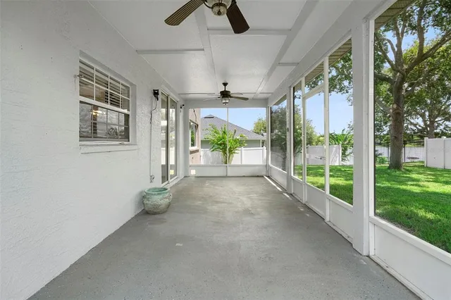 a view of a porch and garden