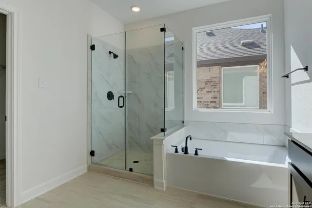a view of bathroom with a toilet sink and vanity