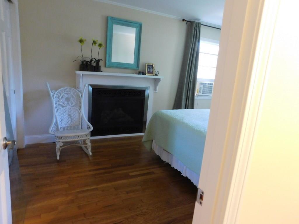 232 Port Road Wells, ME 04090 - Photo 9 of 14 Master bedroom gas fireplace.