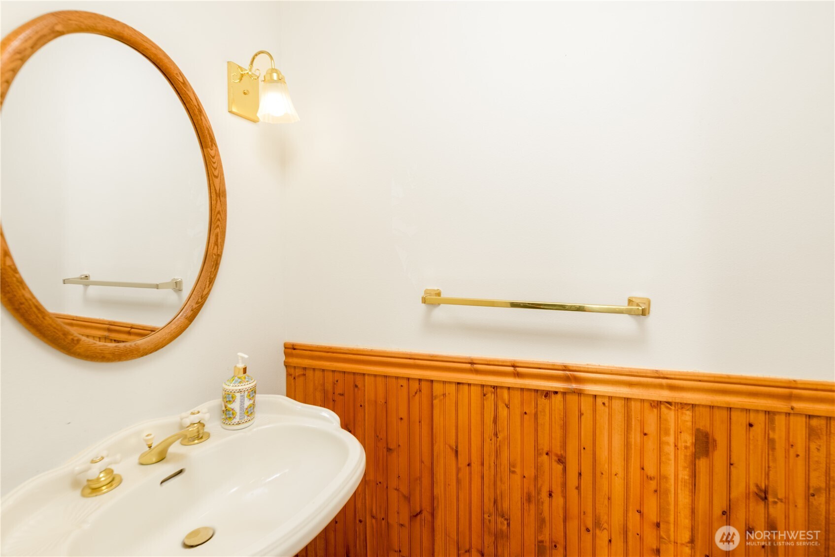 301 Mt Pleasant Estates Road Port Angeles, WA 98362 - Photo 14 of 40 a bathroom with a sink and a mirror