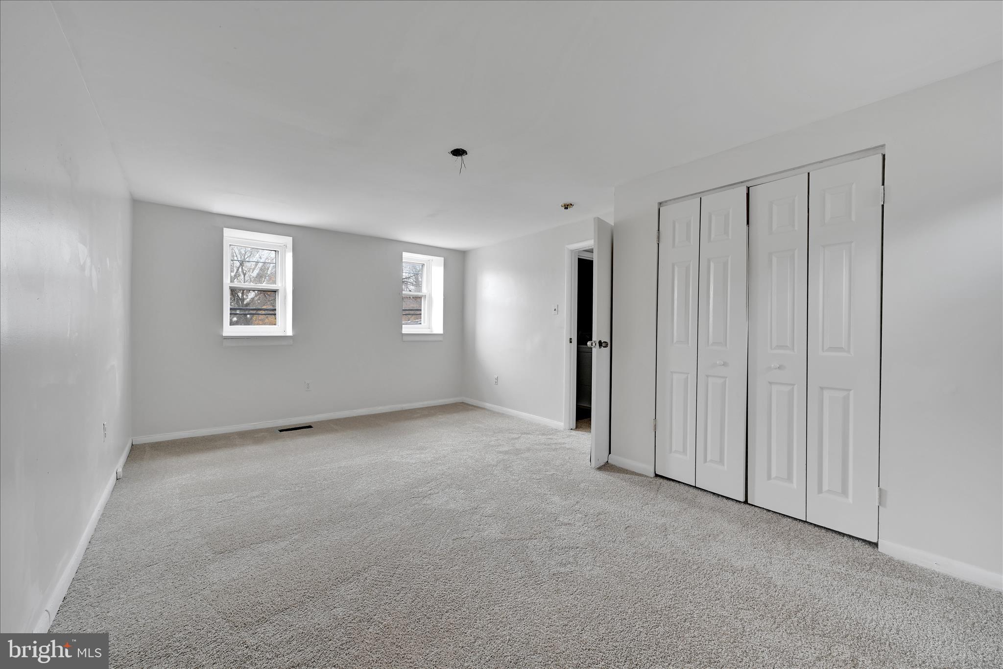 4301 Aston Mills Road Aston, PA 19014 - Photo 21 of 33 a view of an empty room with a window