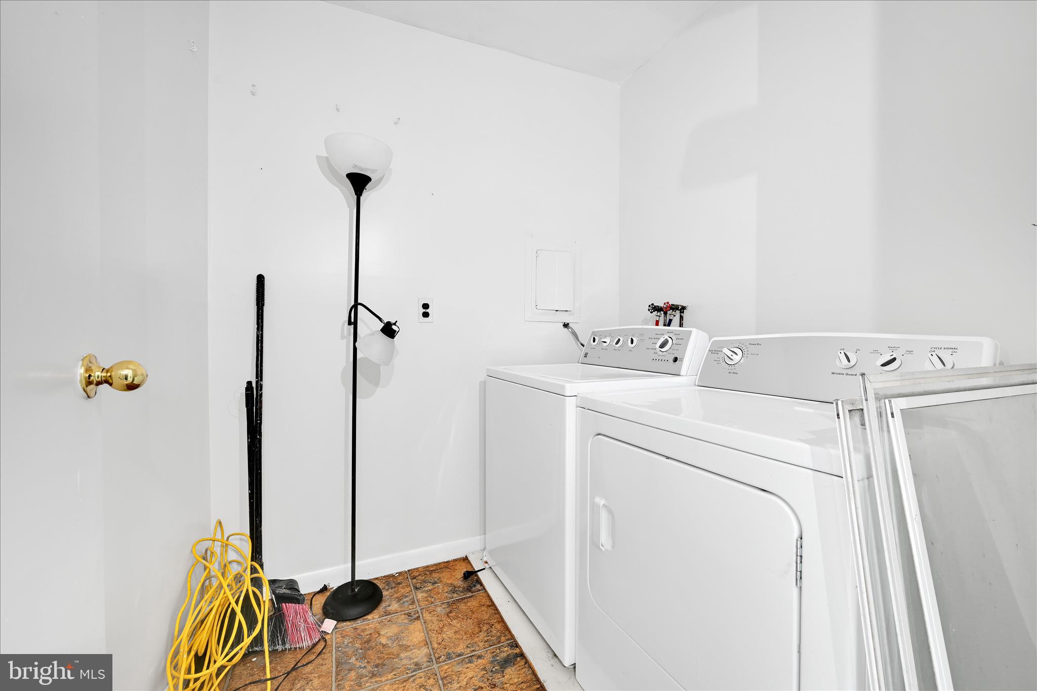 4301 Aston Mills Road Aston, PA 19014 - Photo 24 of 33 a utility room with dryer and washer