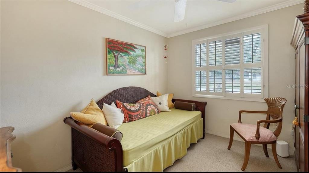 2264 Floyd Street Sarasota, FL 34239 - Photo 13 of 17 a bedroom with furniture and a window