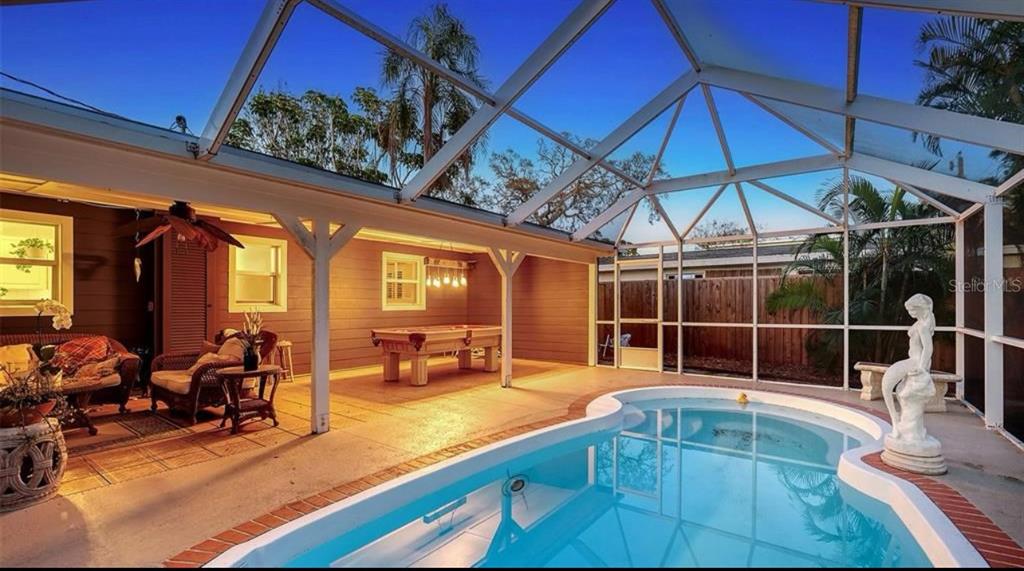2264 Floyd Street Sarasota, FL 34239 - Photo 17 of 17 a view of a swimming pool with a patio