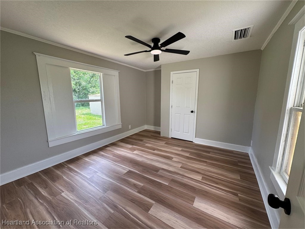 111 D Street Frostproof, FL 33843 - Photo 12 of 40 a view of an empty room with a window