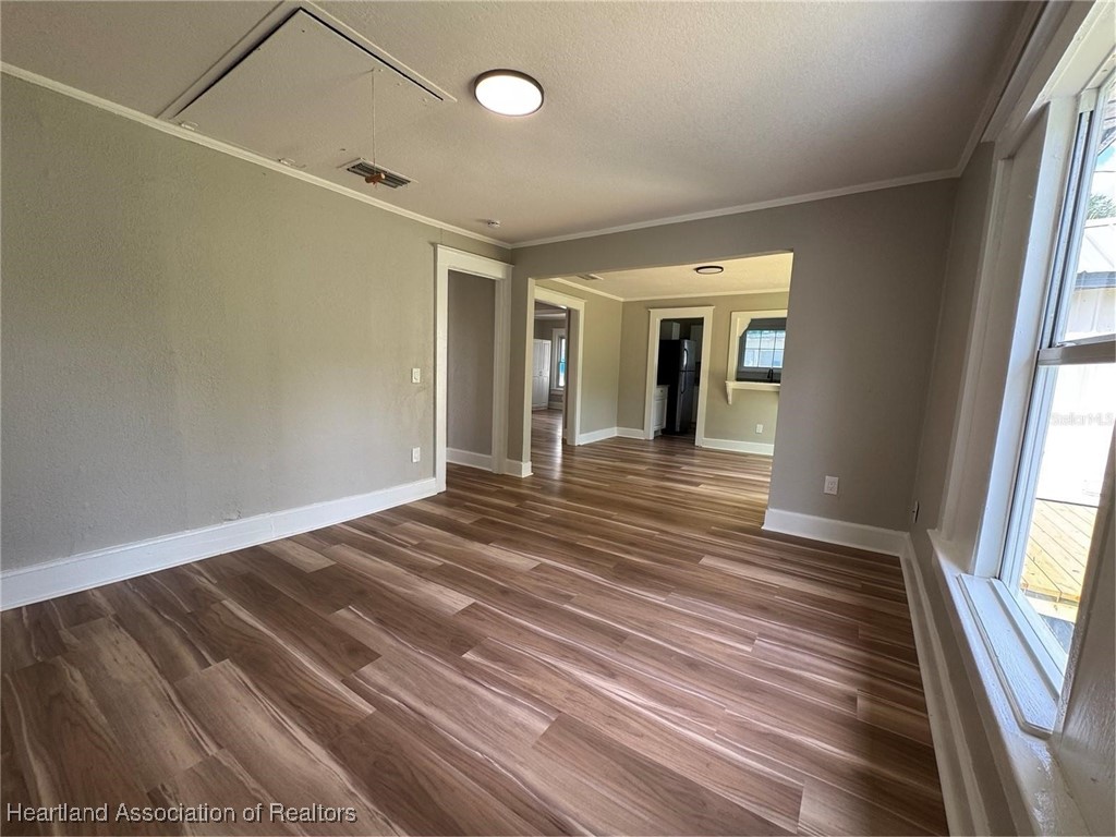 111 D Street Frostproof, FL 33843 - Photo 14 of 40 a view of a room with wooden floor and windows