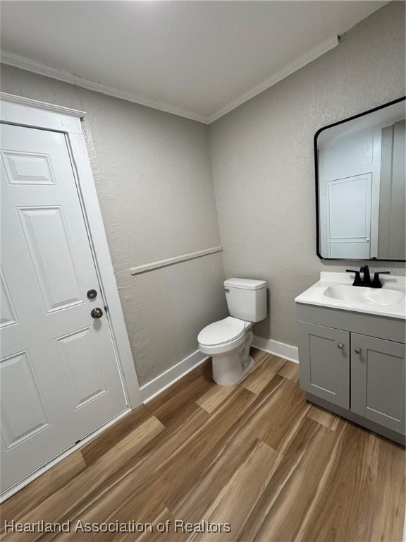 111 D Street Frostproof, FL 33843 - Photo 28 of 40 a bathroom with a toilet sink and mirror