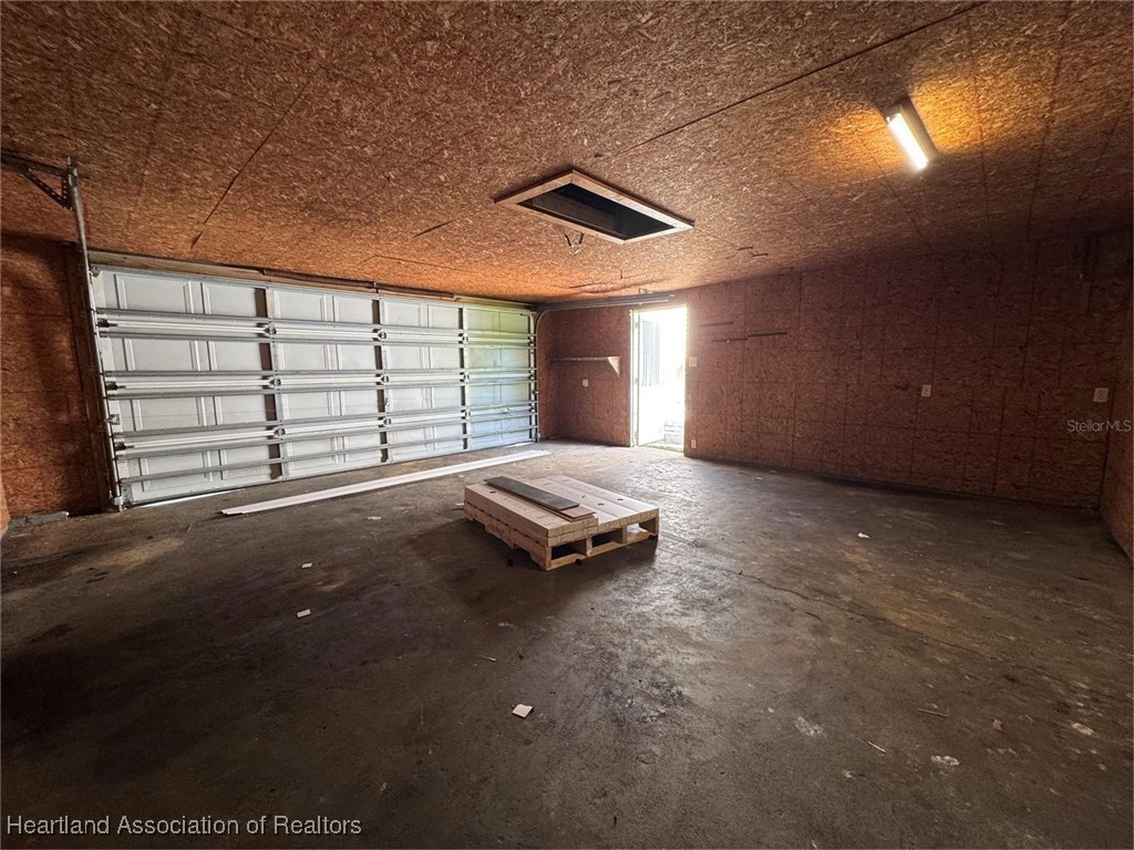 111 D Street Frostproof, FL 33843 - Photo 37 of 40 a view of a room with a ceiling fan and window