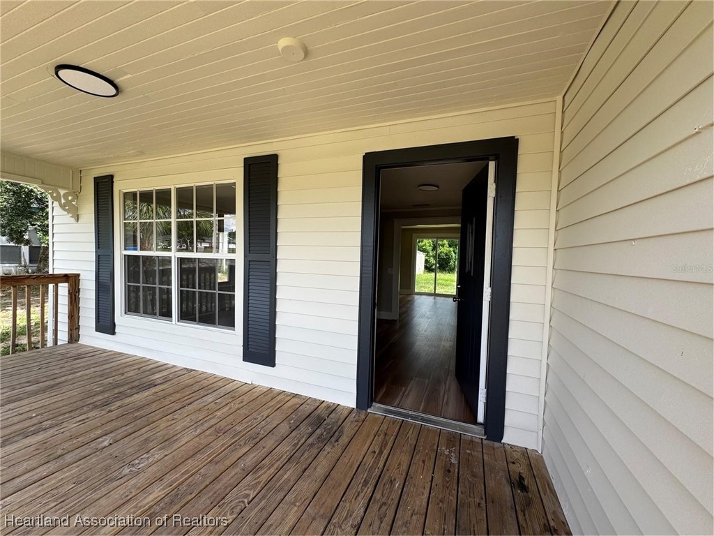 111 D Street Frostproof, FL 33843 - Photo 4 of 40 a view of a room with wooden floor and windows