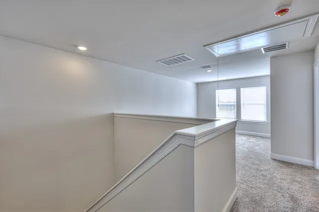 a utility room with washer and dryer