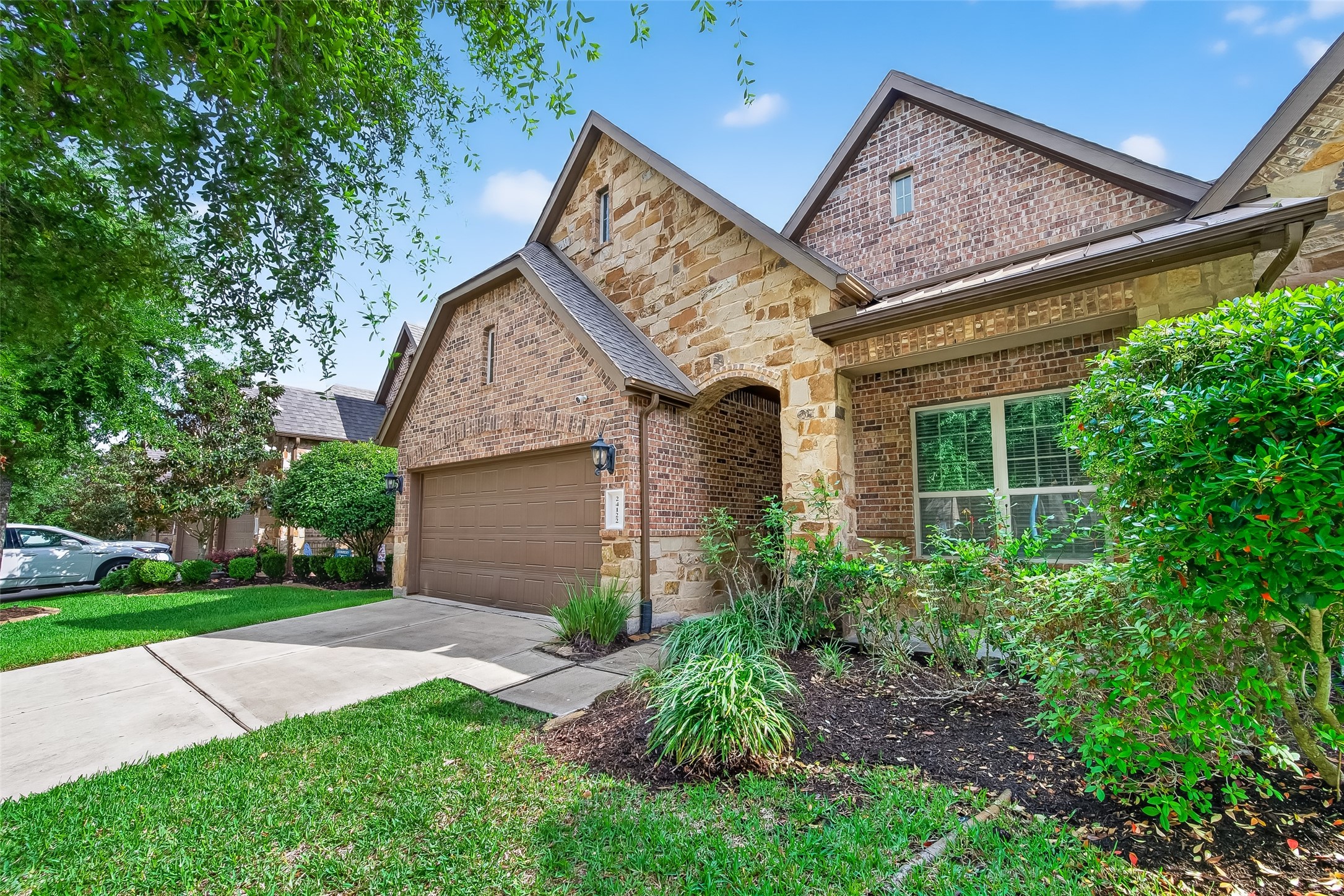 24122 Valencia Ridge Lane Katy, TX 77494 - Photo 2 of 48 Another view of the home showing the well maintained landscaping.