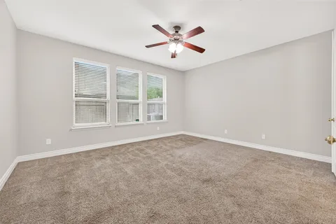 a living room with furniture and a projector
