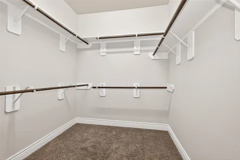 a view of small space with racks on the wall