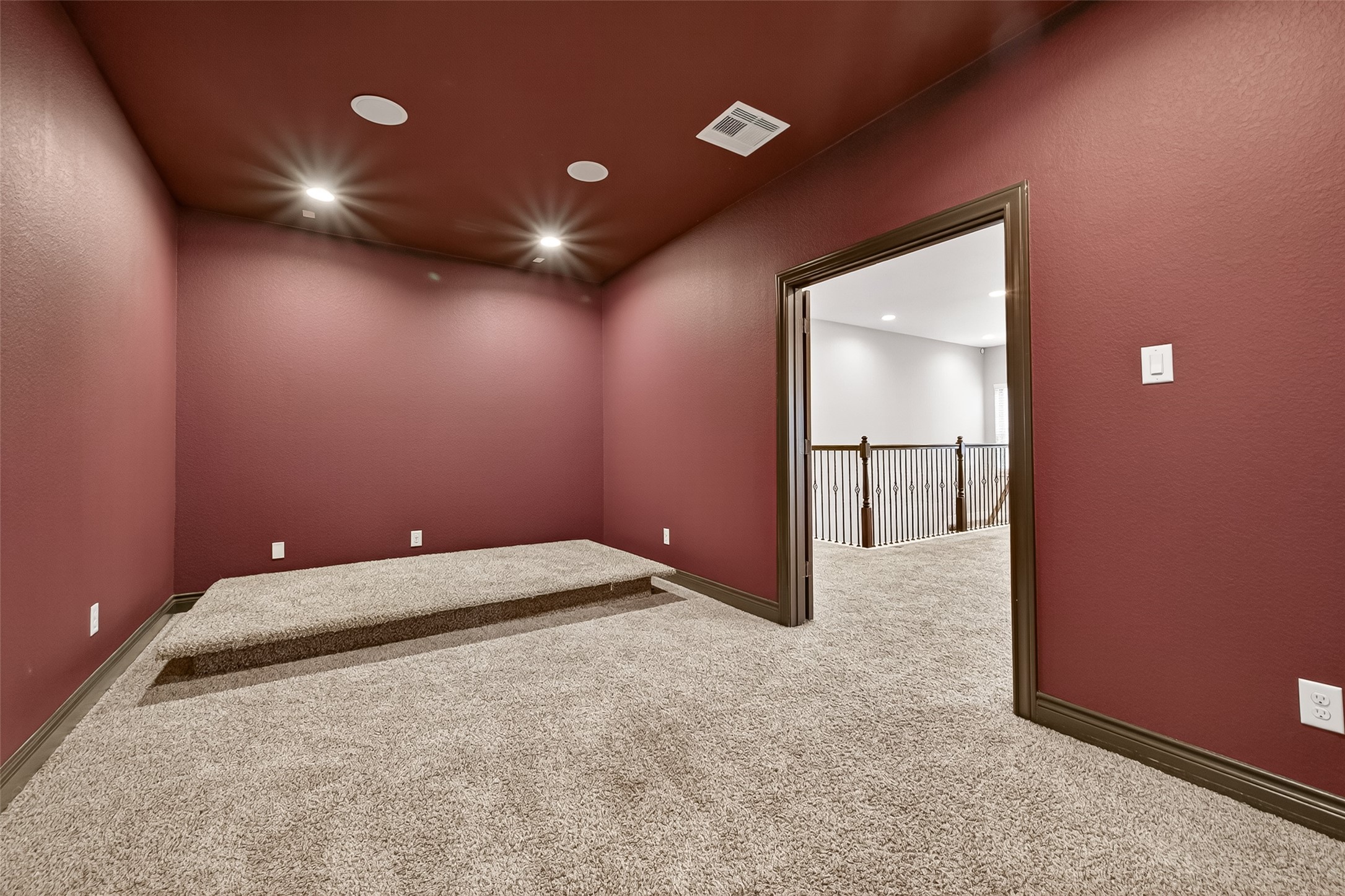 24122 Valencia Ridge Lane Katy, TX 77494 - Photo 35 of 48 View of the Media Room featuring a platform for theater-like feel.